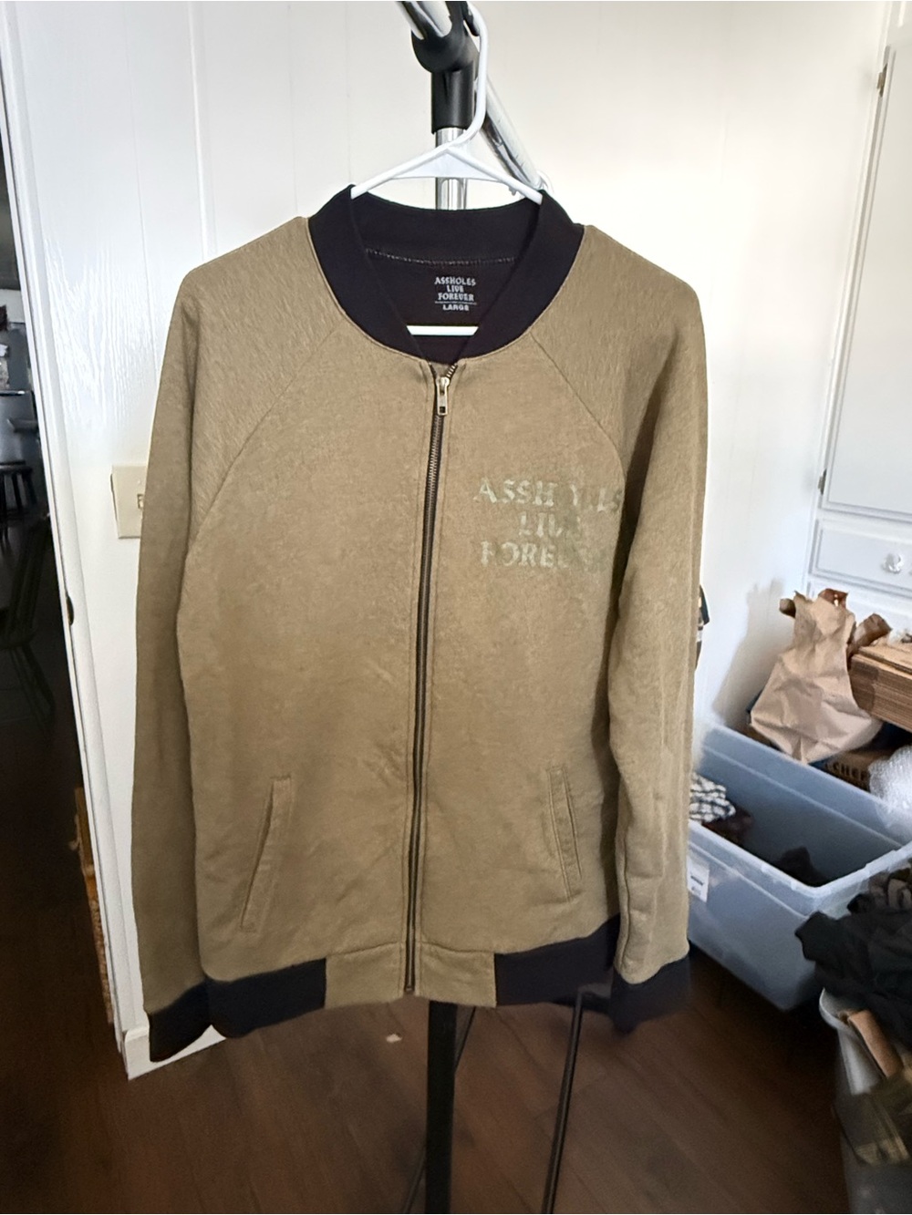 Men's Olive “A**holes Live Forever” zipup sweatshirt.